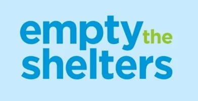 Blue text on a light blue background reads empty the shelters, with the word the in green.